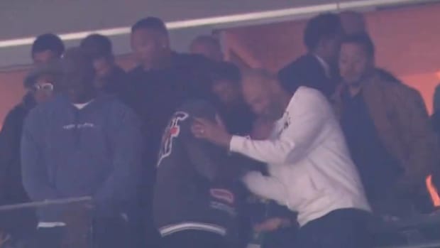 Several stars take in the CFP national championship from a suite at NRG Stadium.